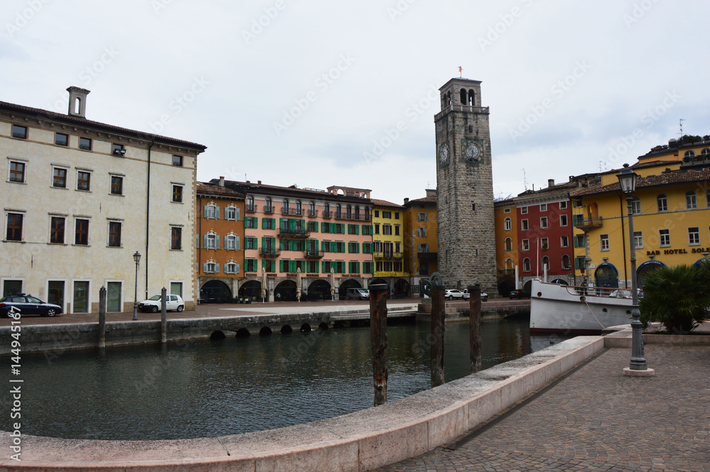 Piazza catena with Apponale Tower, panoramic picture of Lake Garda taken in Riva del Garda, Italy