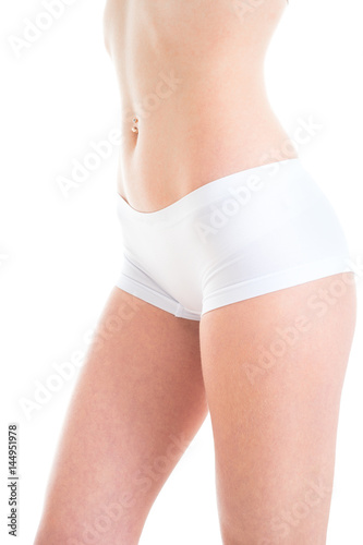 Slim woman body isolated on white background. Side view closeup