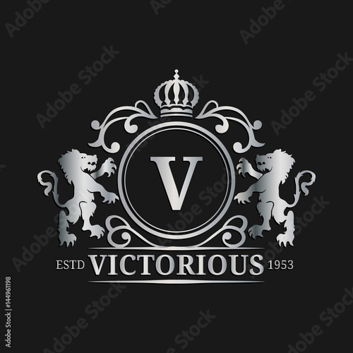 Vector monogram logo template. Luxury letter design. Graceful vintage character with crown and lions illustration.
