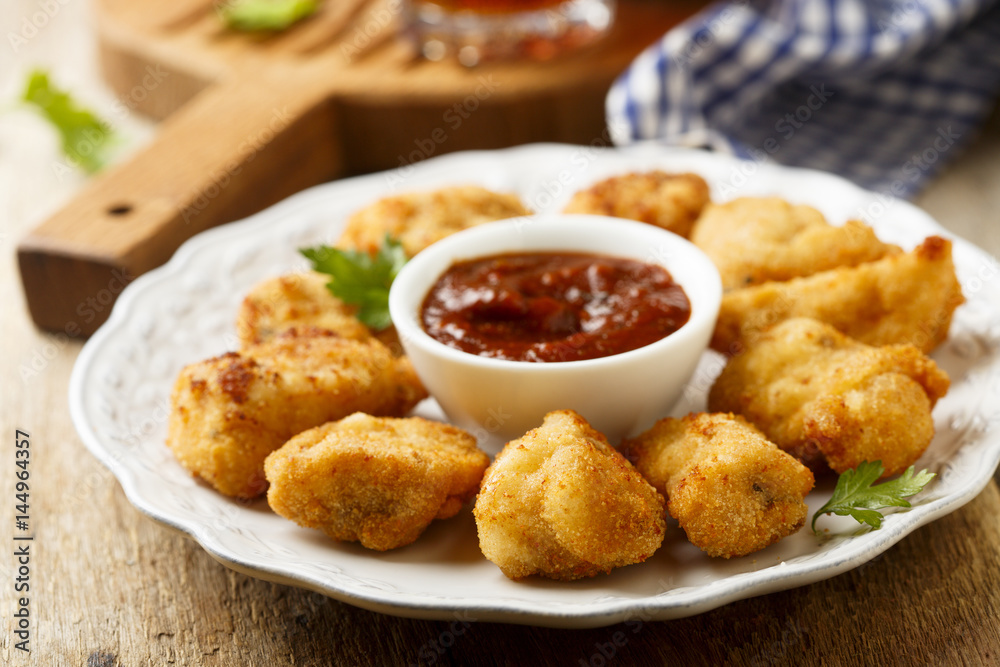 Chicken nuggets with tomato sauce Chicken nuggets with tomato sauce