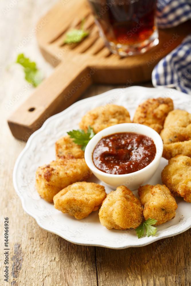 Chicken nuggets with tomato sauce Chicken nuggets with tomato sauce