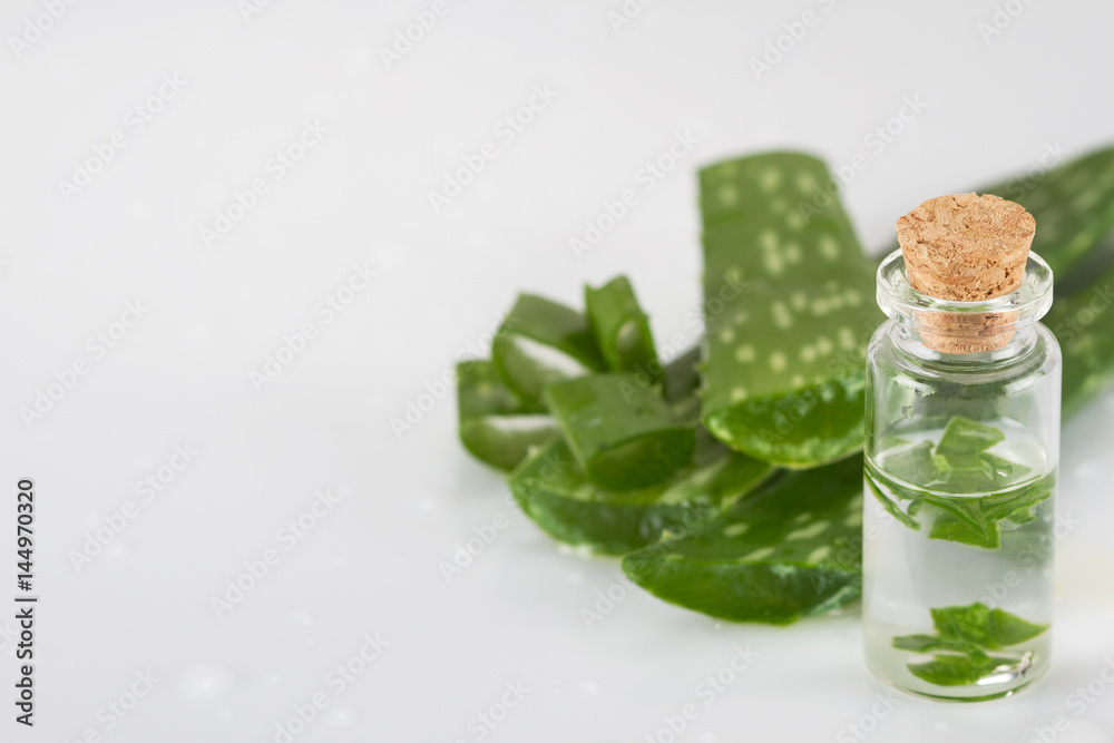 Aloe vera juice and fresh aloe vera leaves Aloe vera juice and fresh aloe vera leaves