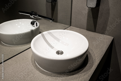 Modern european ceramic sink, Washstands with photocells, Public toilet with wash basins detail, Contemporary European white sink, Ceramic sink with contactless sensor, Symbol of modern cleansing