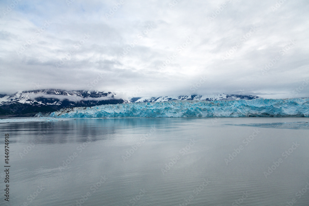 Blue Glacier Ice in Misty Waters
