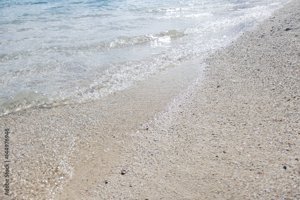 sand and water on the tropical beach sand and water on the tropical beach