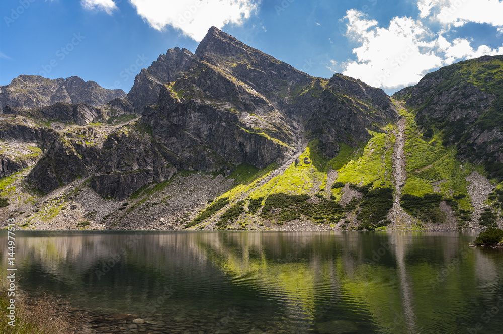 Beautiful summer landscape of Black Pond Gasienicowy in Tatra Mountains.