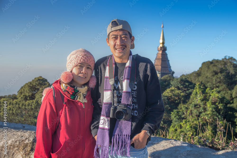 Happy woman and Photographer man traveler enjoy in holiday and castle on vacation while spring in travel trip Chiang mai