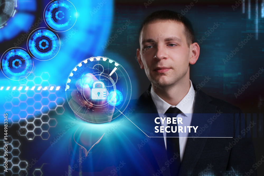Business, Technology, Internet and network concept. Young businessman working on a virtual screen of the future and sees the inscription: Cyber security Business, Technology, Internet and network concept. Young businessman working on a virtual screen of the future and sees the inscription: Cyber security