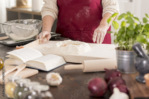 Woman preparing a dough