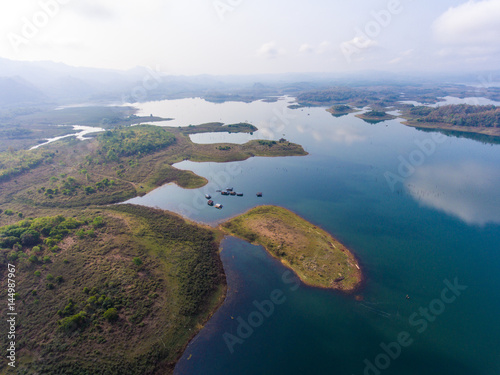 Aerial view of small islands in a lake at morning light
