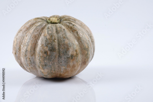 Sweet orange pumpkin isolated on white.