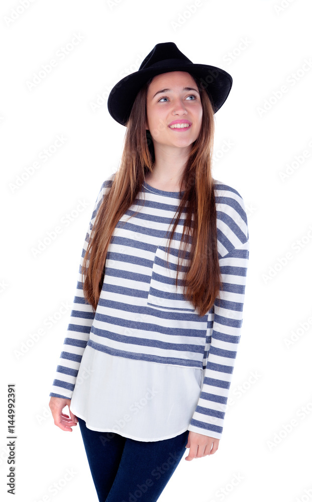 Pretty teenager girl with black hat posing at studio. Pretty teenager girl with black hat posing at studio.