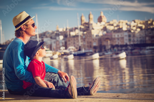 father and son looking at city of Valetta, Malta © nadezhda1906
