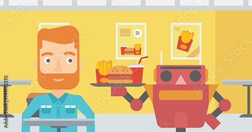 Robot making coffee for a client at coffee shop.