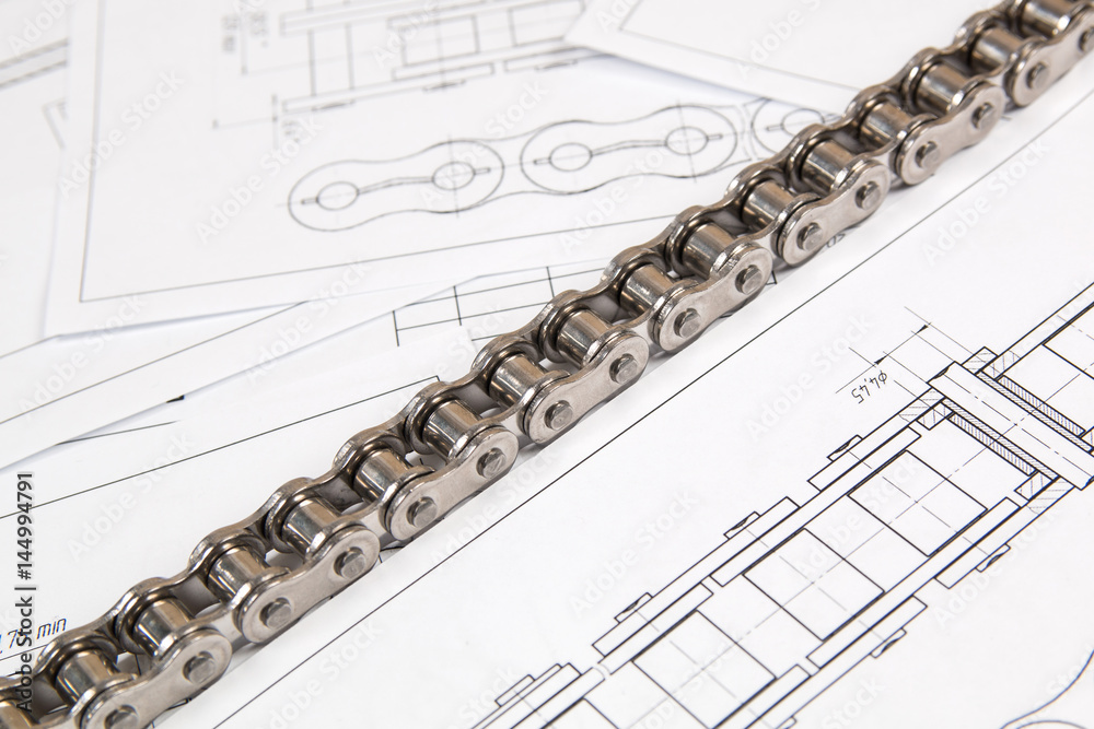 Obraz premium Driving roller chain and technical engineering drawings. Mechanical engineering, technology of metal processing.