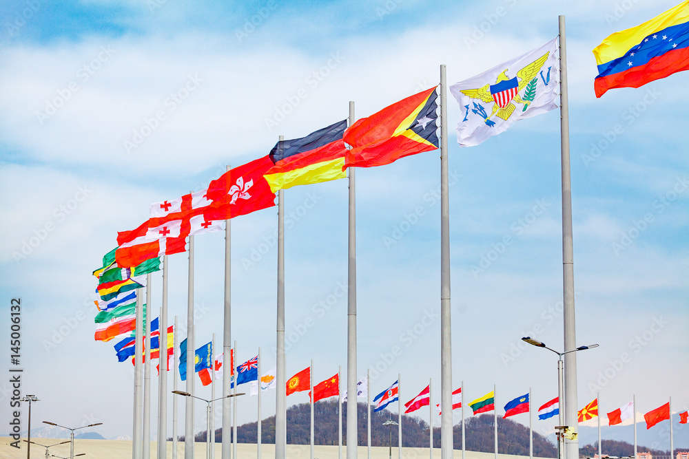 Flags of countries. different countries on the flagpole Flags of countries. different countries on the flagpole