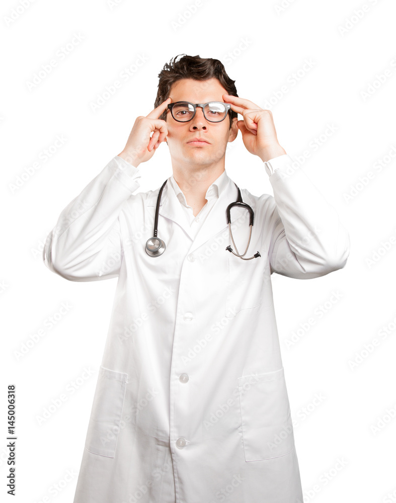 Confident doctor with concentration gesture against white background Confident doctor with concentration gesture against white background