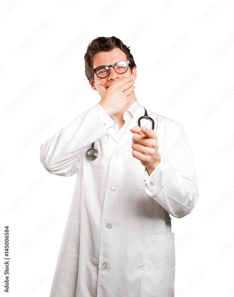 Funny doctor laughin at you against white background