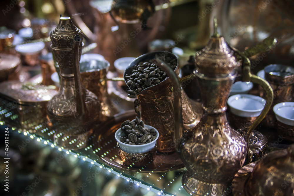 Traditional handcrafted copper coffee pots in souvenir shop in Sarajevo