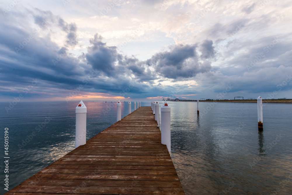 Fototapeta premium Hemingway Pier Next to the Bay Bridge outside of Annapolis Maryland at Sunset