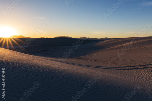 Golden hour light at sunset on the sand dunes
