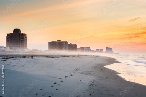 Sandy Beach in ventnor city beach in atlantic city, new jersey at sunrise photo