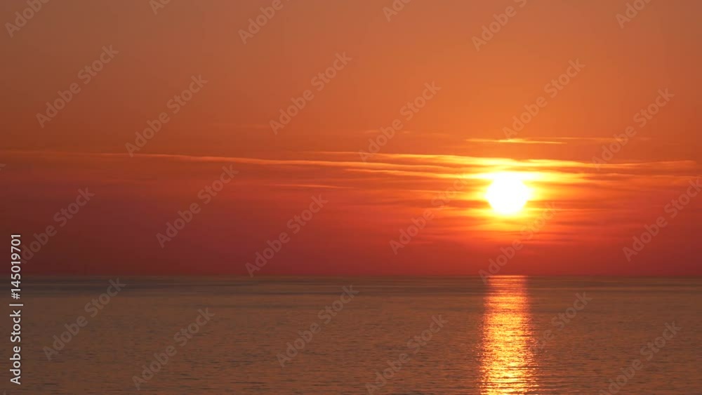 scenic view of beautiful sunset above the sea scenic view of beautiful sunset above the sea