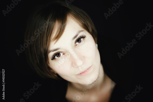 Beautiful young woman studio portrait with led light 