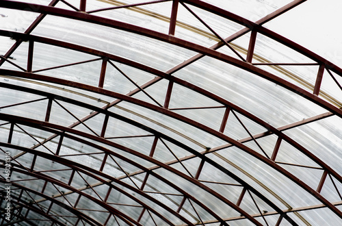 A canopy made of polycarbonate arc . Metal construction.  