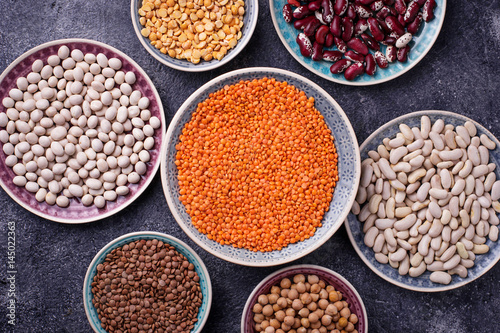 Various legumes. Chickpeas, red lentils, black lentils, yellow peas and beans