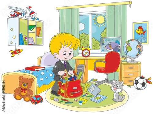 Schoolboy completing a schoolbag in his room