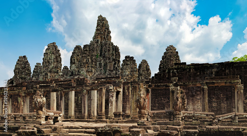 Prasat Bayon with smiling stone faces is the central temple of Angkor Thom Complex, Siem Reap, Cambodia. Ancient Khmer architecture and famous Cambodian landmark, World Heritage.