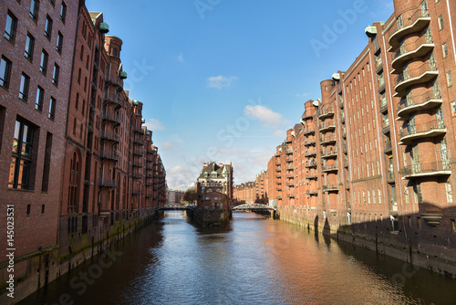 Fototapeta Naklejka Na Ścianę i Meble -  Famous Speicherstadt warehouse district with blue sky in Hamburg, Germany