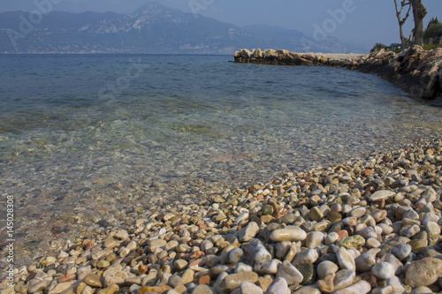 Pebbles in crystal clear lake water