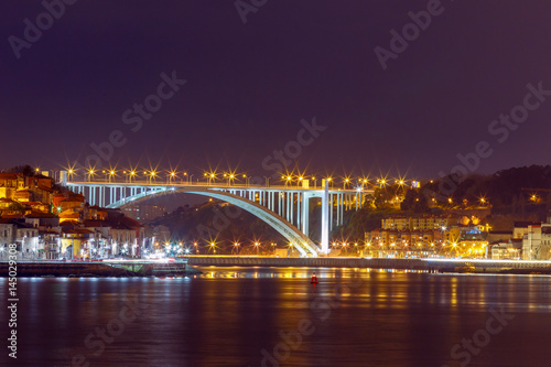 Porto. The car bridge over the Douro River. © pillerss