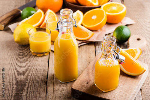 Freshly squeezed orange juice in bottles