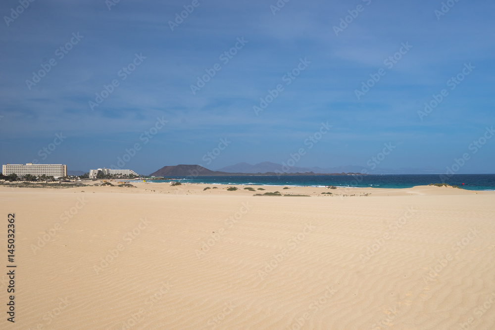 Sand dunes on the seashore of the Islands on the Atlantic Ocean. Nobody, only steps