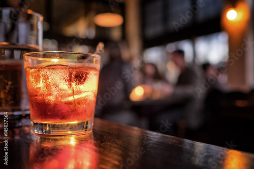 Fényképezés Cocktail close up in a bar setting