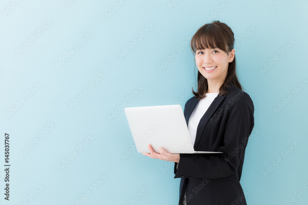 portrait of asian businesswoman isolated on blue background portrait of asian businesswoman isolated on blue background