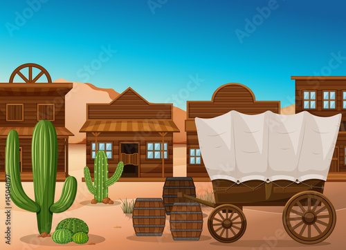 Wooden wagon and building in desert