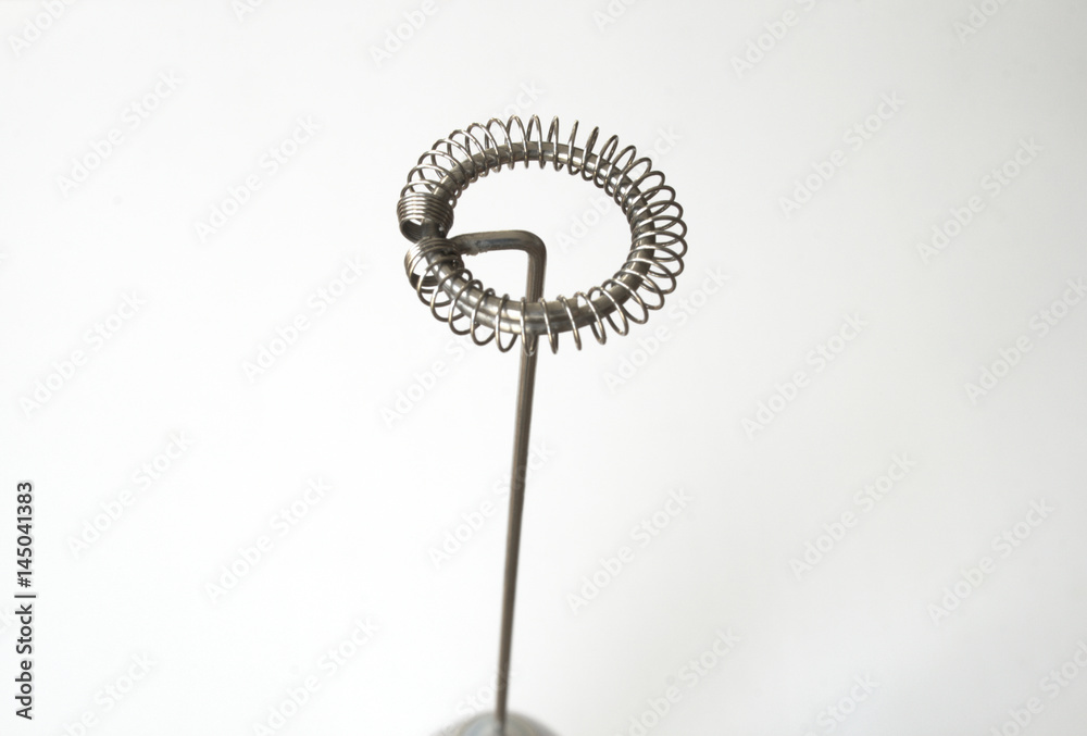 Milk frother foamer blender close-up isolated on white background Milk frother foamer blender close-up isolated on white background