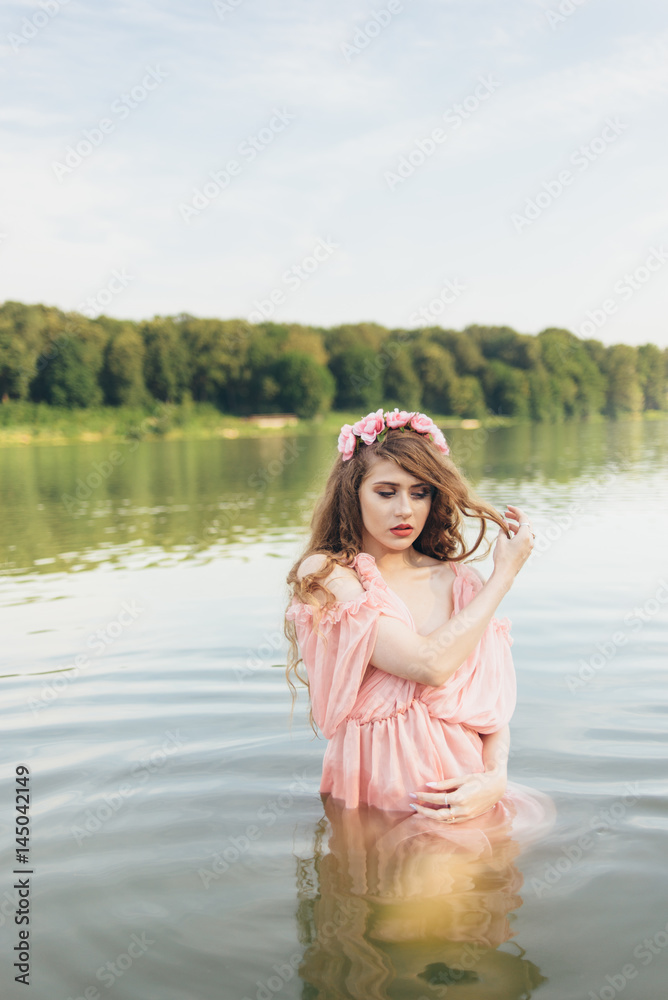 Girl with a wreath in the water Girl with a wreath in the water
