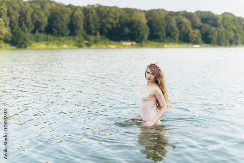  Girl with a wreath in the water