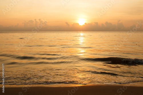 Sunset over sea and beach