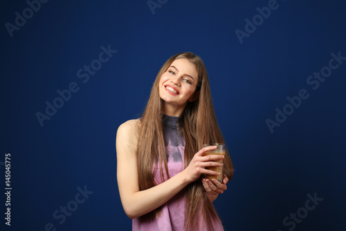 Beautiful young woman with ...