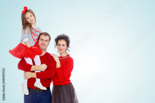 Happy parents and young daughter.