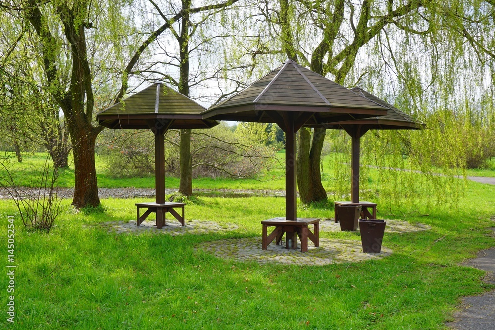 Wooden gazebo in spring parks - relax and unwind
Wooden gazebo in spring parks - relax and unwind