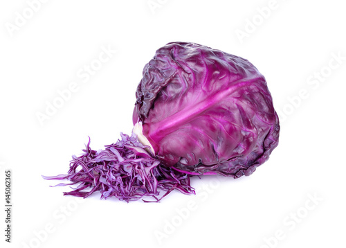 whole and sliced fresh red cabbage on white background
