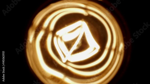 Light Bulb In Macro On Black Background