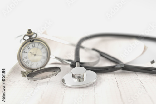 stethoscope with stopwatch on ecg sheet © YAOWARAT
